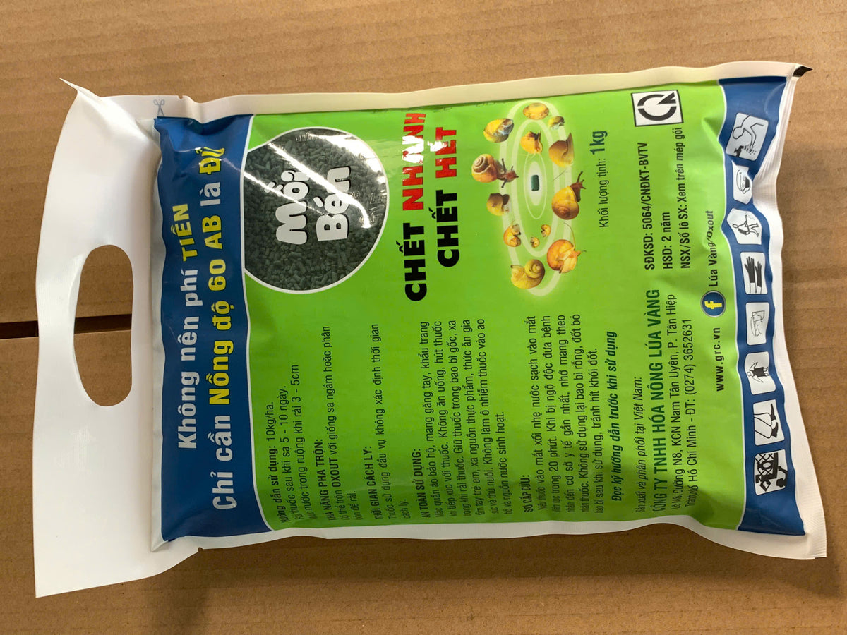 Mặt sau gói TOXBAIT OXOUT 60AB 1kg với hướng dẫn liều 10kg/ha và cảnh báo an toàn.