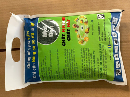 Mặt sau gói TOXBAIT OXOUT 60AB 1kg với hướng dẫn liều 10kg/ha và cảnh báo an toàn.