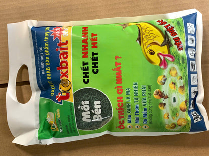 Mặt trước gói TOXBAIT OXOUT 60AB 1kg chứa Metaldehyde 60g/kg.